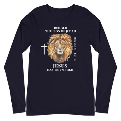 Flatlay of a navy Christian long-sleeve shirt that says &quot;Behold the lion of Judah&quot;. Below the text, there is a graphic of a lion, with a cross icon next to it, and &quot;Revelation 5:5&quot;. On the bottom, text says &quot;JESUS has triumphed&quot;
